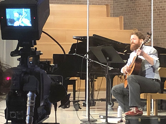 Guitarist performing at church